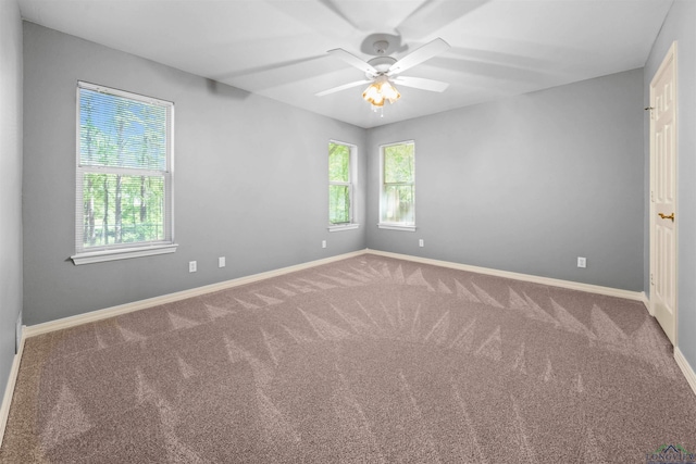 1804 W Lake Dr, Gladewater, TX 75647 - unfurnished room with ceiling fan and carpet