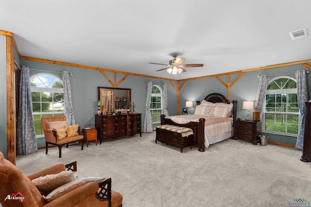 453 Wiggins Rd, Karnack, TX 75661 - carpeted bedroom featuring ceiling fan