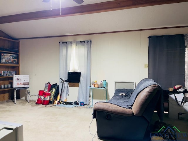 living area featuring carpet floors and ceiling fan