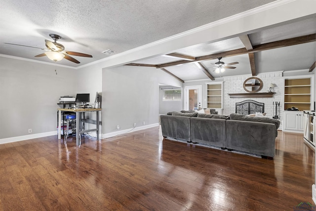 living room with baseboards, a ceiling fan, visible vents, and a textured ceiling