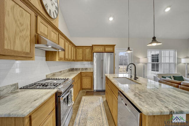 17255 Stella Maris St, Winona, TX 75792 - kitchen featuring a center island with sink, a sink, decorative backsplash, under cabinet range hood, and appliances with stainless steel finishes