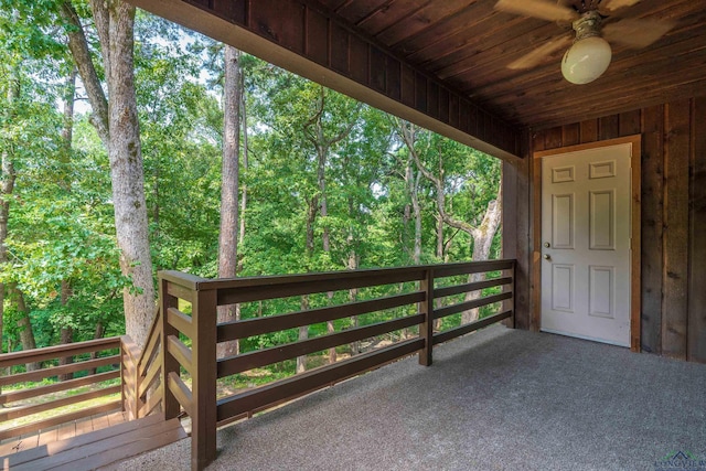 exterior space with ceiling fan