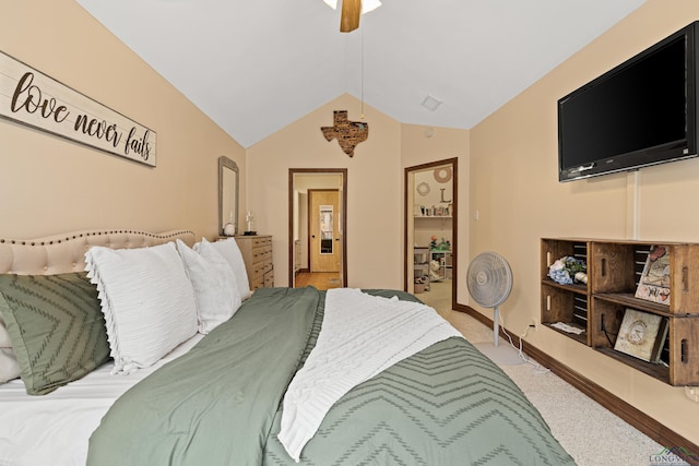 bedroom featuring carpet floors, ceiling fan, and vaulted ceiling