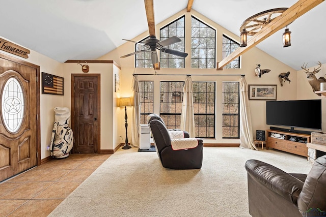 living room with light tile patterned floors, light colored carpet, ceiling fan, high vaulted ceiling, and beam ceiling