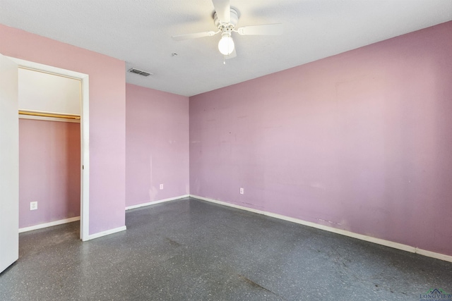 unfurnished bedroom with a closet and ceiling fan