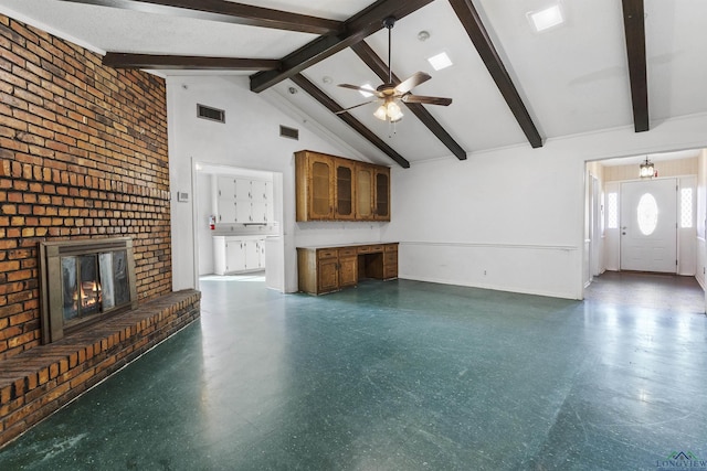 unfurnished living room featuring beamed ceiling, a brick fireplace, high vaulted ceiling, and ceiling fan