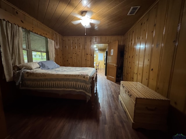 1641 Handy Rd, Diana, TX 75640 - bedroom with hardwood / wood-style flooring, wood ceiling, and wooden walls
