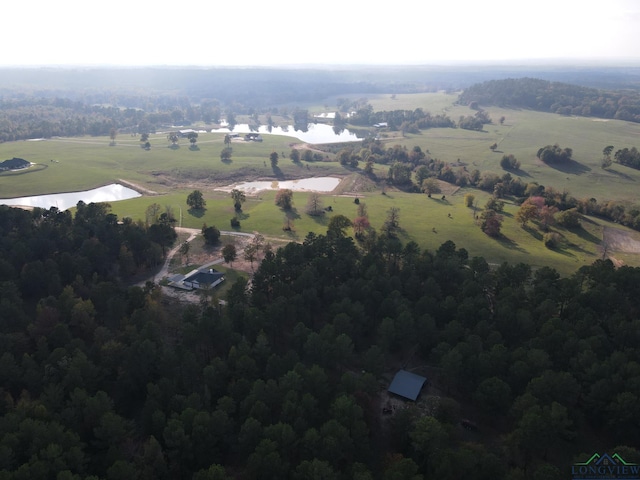 bird's eye view featuring a water view and a rural view