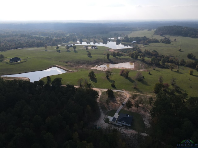 aerial view with a rural view and a water view