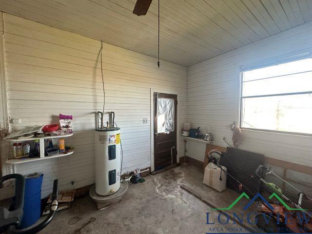729 Rosehill Rd, Timpson, TX 75975 - interior space with water heater