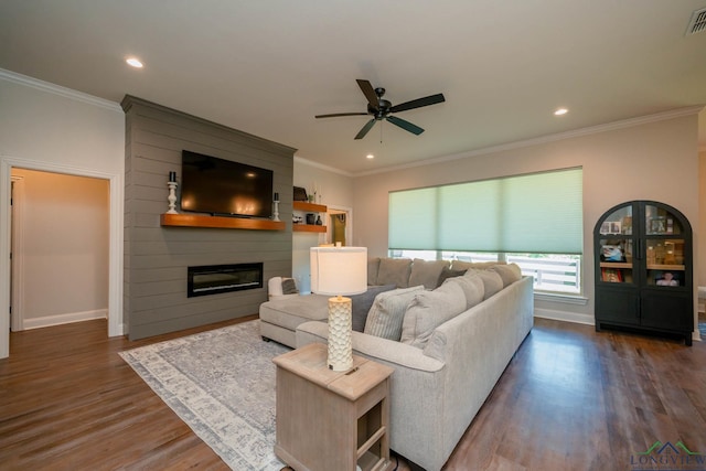 4523 Lone Oak Ln, Longview, TX 75605 - living room featuring a ceiling fan, wood finished floors, a large fireplace, ornamental molding, and recessed lighting