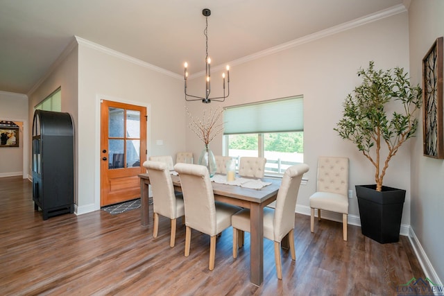 4523 Lone Oak Ln, Longview, TX 75605 - dining room with a chandelier, wood finished floors, and ornamental molding