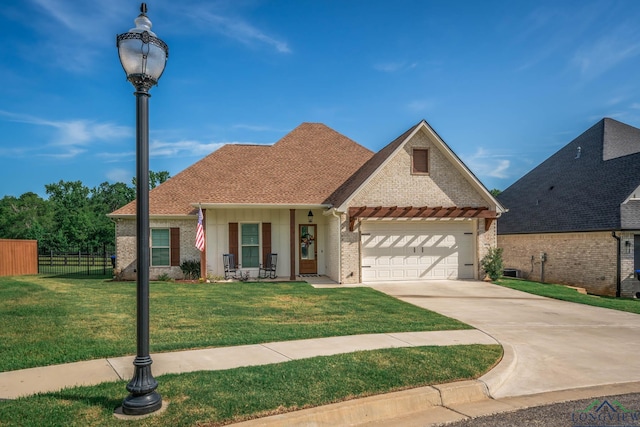 4523 Lone Oak Ln, Longview, TX 75605 - view of front of property featuring brick siding, a garage, and concrete driveway