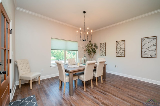 4523 Lone Oak Ln, Longview, TX 75605 - dining area with a chandelier, wood finished floors, and crown molding