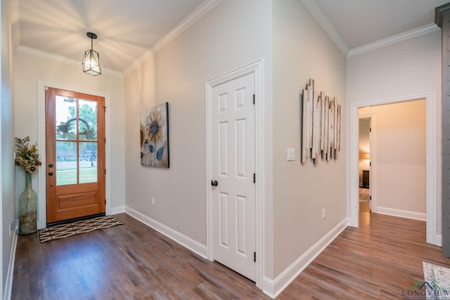 4523 Lone Oak Ln, Longview, TX 75605 - foyer with wood finished floors and ornamental molding