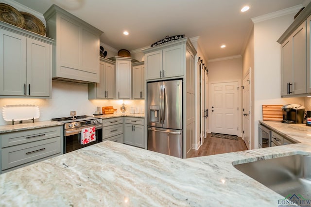 4523 Lone Oak Ln, Longview, TX 75605 - kitchen featuring stainless steel appliances, gray cabinets, crown molding, light stone counters, and tasteful backsplash