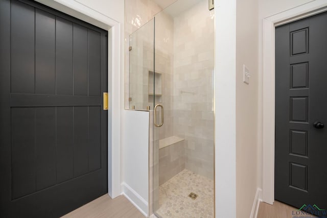 bathroom with a stall shower