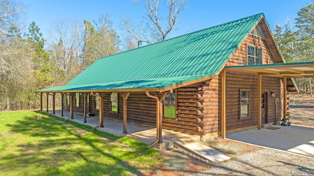 view of property's community with a lawn