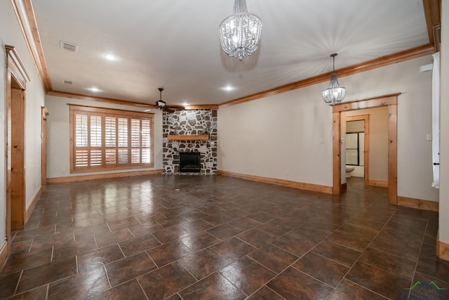 unfurnished living room featuring ceiling fan with notable chandelier, a stone fireplace, and crown molding