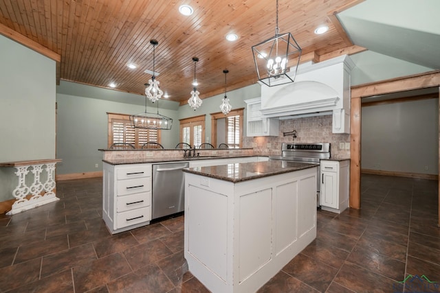 kitchen with kitchen peninsula, wood ceiling, stainless steel appliances, pendant lighting, and white cabinets