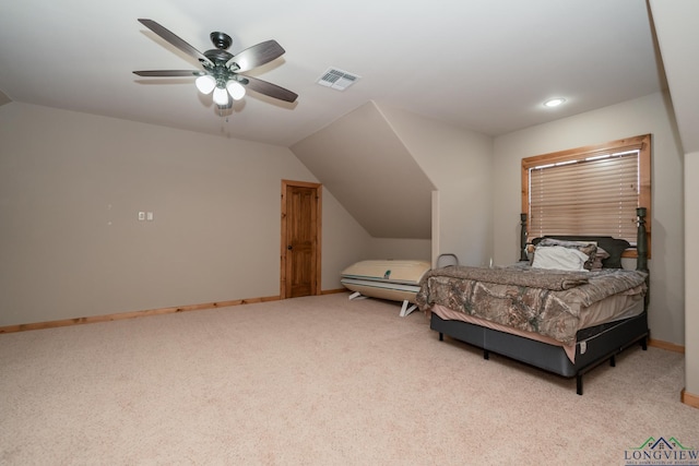 carpeted bedroom featuring ceiling fan and lofted ceiling