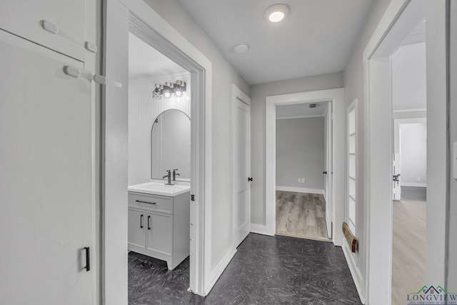 3608 Fm 1970, Carthage, TX 75633 - bathroom with vanity and baseboards