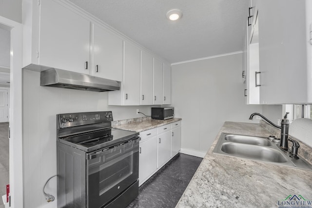 3608 Fm 1970, Carthage, TX 75633 - kitchen featuring black range with electric cooktop, under cabinet range hood, stainless steel microwave, a sink, and white cabinetry