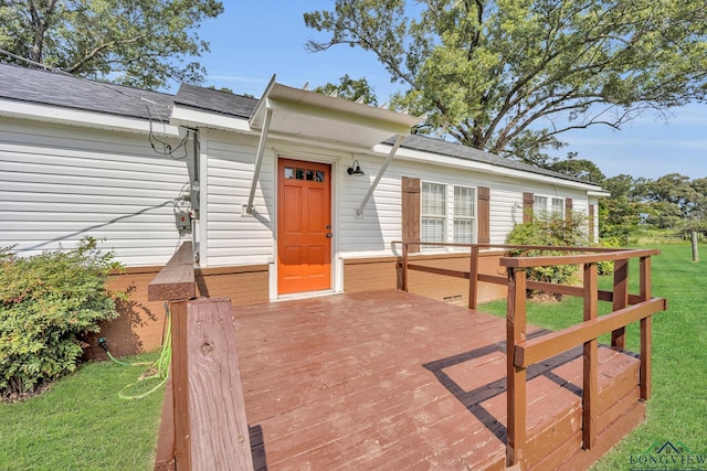 3608 Fm 1970, Carthage, TX 75633 - wooden deck featuring a lawn