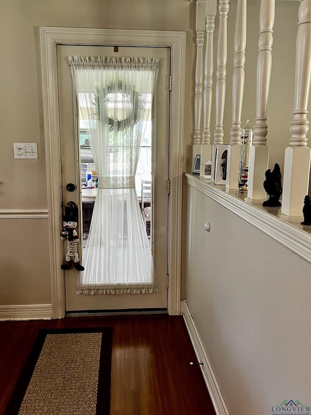 entryway featuring dark wood-type flooring