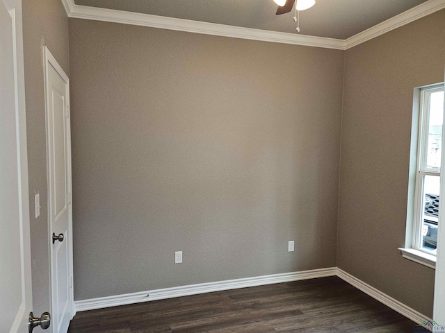 spare room with crown molding, ceiling fan, and dark hardwood / wood-style flooring