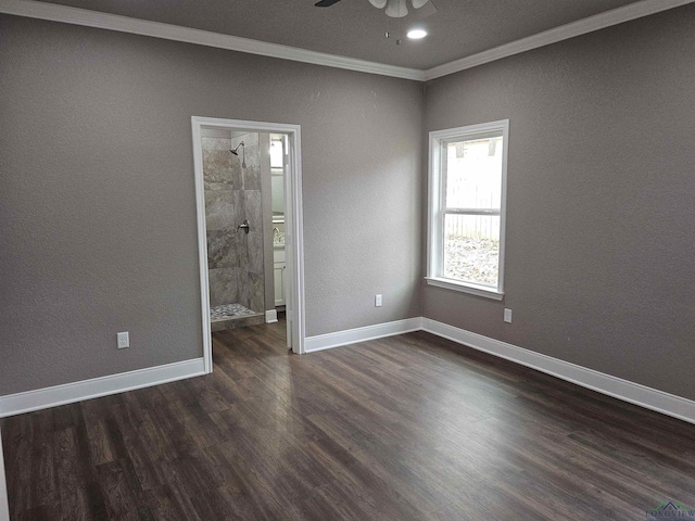 spare room with crown molding, ceiling fan, and dark hardwood / wood-style floors