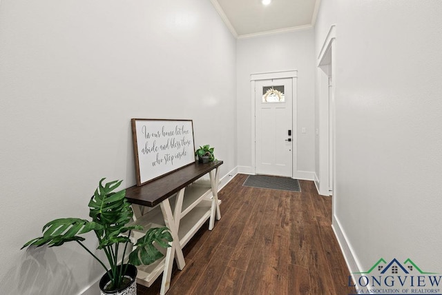 doorway to outside with dark hardwood / wood-style flooring and crown molding