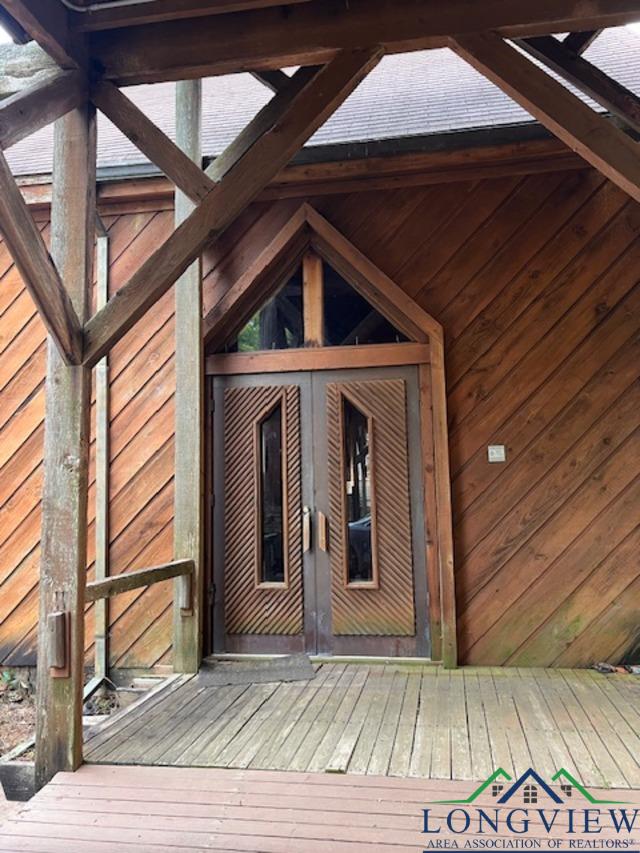 entrance to property featuring french doors