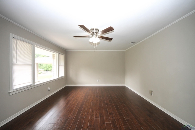 unfurnished room featuring ceiling fan, dark hardwood / wood-style flooring, and ornamental molding