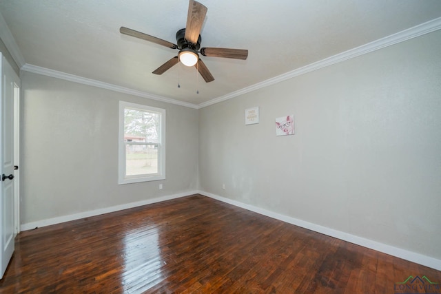 empty room featuring ornamental molding, dark wood-style flooring, ceiling fan, and baseboards