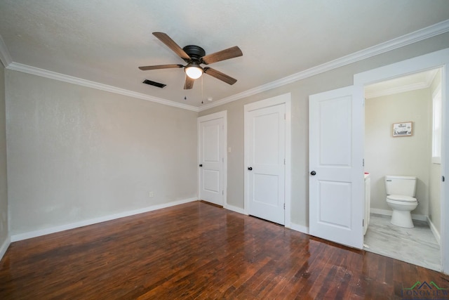 unfurnished bedroom with ceiling fan, dark wood-style flooring, visible vents, baseboards, and ornamental molding