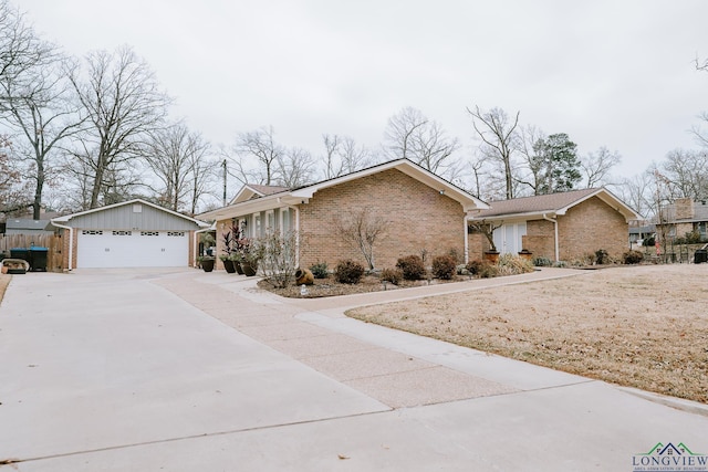 single story home with a garage