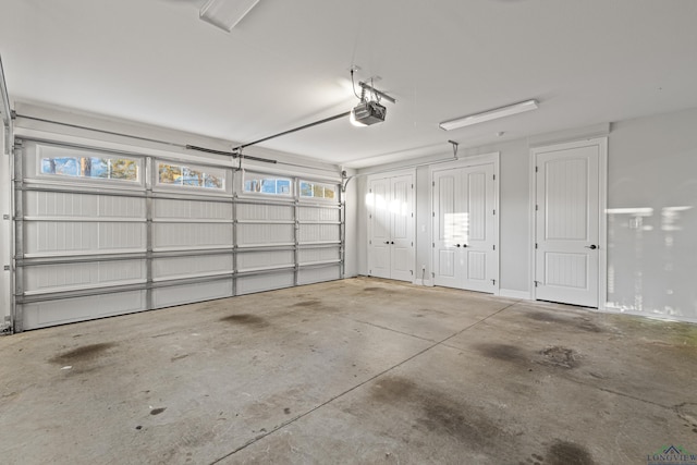 garage featuring a garage door opener