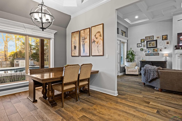 dining room with dark hardwood / wood-style flooring, beam ceiling, an inviting chandelier, coffered ceiling, and crown molding