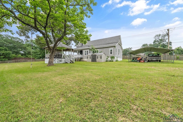 280 S Stonewall St, Tatum, TX 75691 - view of yard with a detached carport and a deck