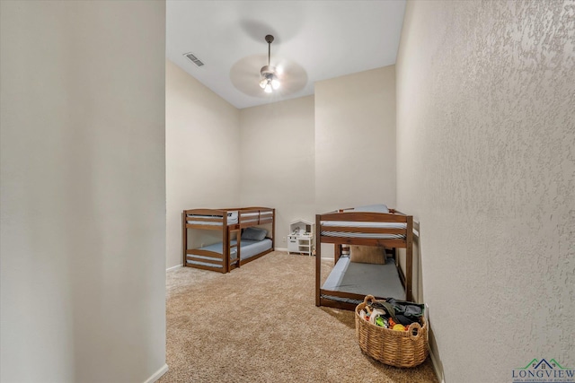 280 S Stonewall St, Tatum, TX 75691 - carpeted bedroom with baseboards and ceiling fan