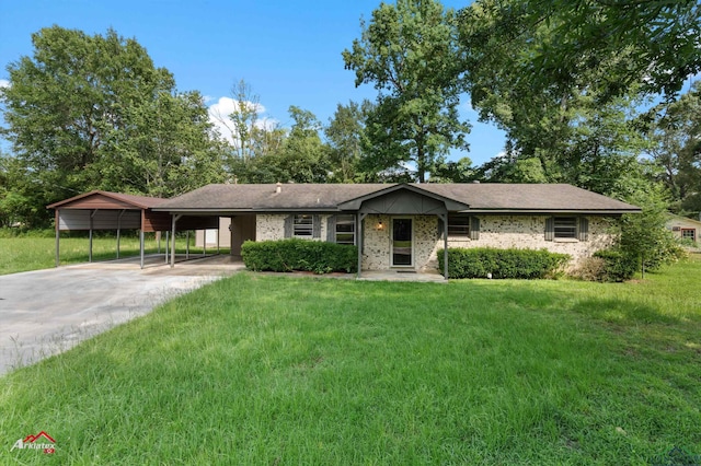 711 Comer St, Carthage, TX 75633 - ranch-style home with a carport, a front lawn, driveway, and brick siding