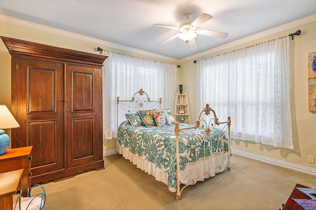 bedroom with ceiling fan, light colored carpet, and ornamental molding