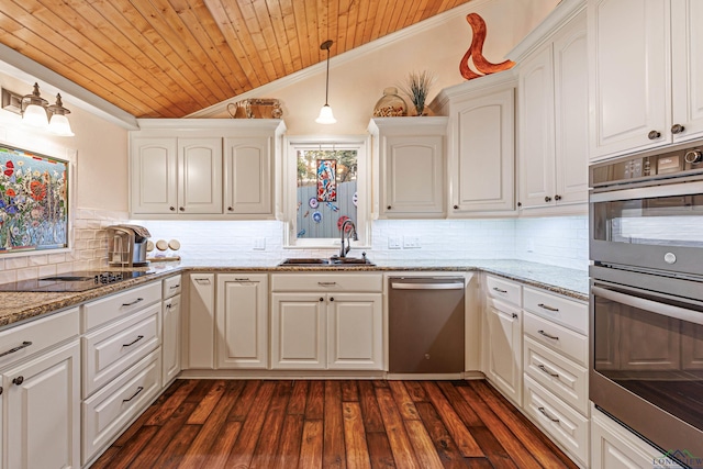 kitchen with white cabinets, sink, light stone countertops, appliances with stainless steel finishes, and wood ceiling