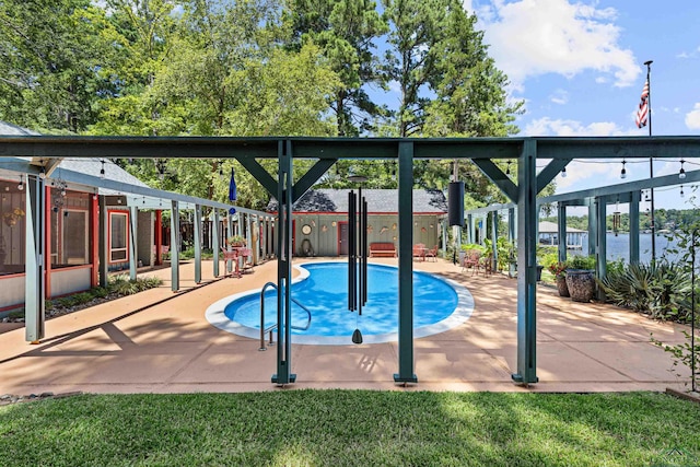 view of swimming pool featuring a water view and a patio area