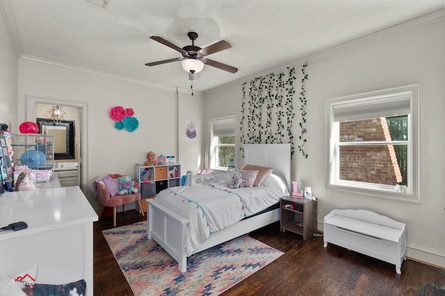 bedroom featuring dark wood-type flooring, ceiling fan, and ornamental molding