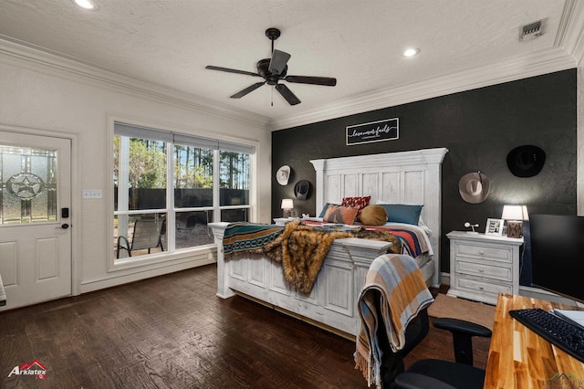 bedroom with ornamental molding, a textured ceiling, ceiling fan, and dark wood-type flooring