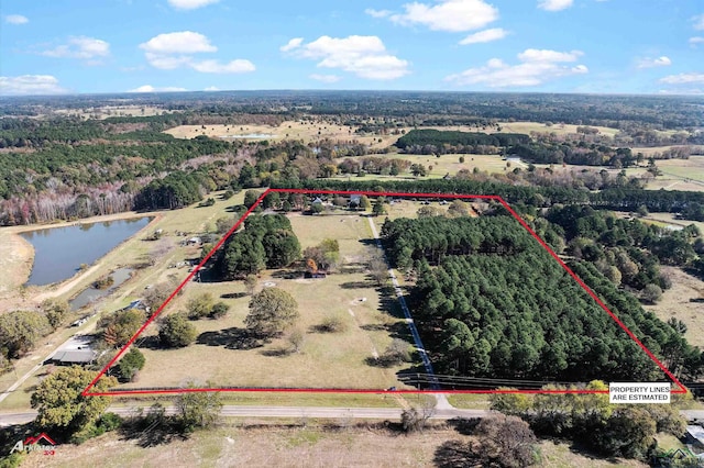 drone / aerial view featuring a rural view and a water view