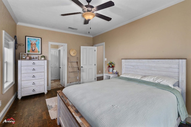 bedroom with ceiling fan, dark hardwood / wood-style flooring, and crown molding