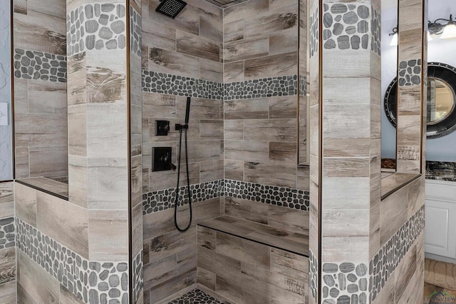 bathroom featuring a tile shower